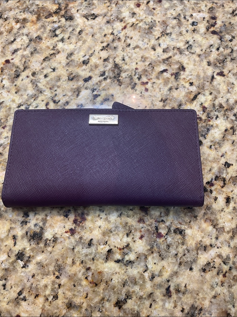 kate spade plum textured leather continental wallet